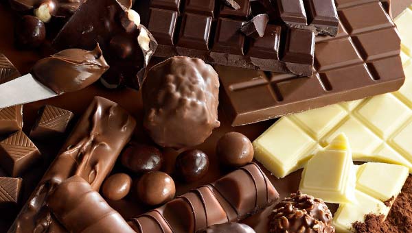 Шоколадки с орехами, черный и белый шоколад, конфеты